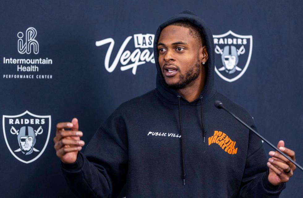 Raiders wide receiver Davante Adams (17) answers to a question during a media interview at the ...