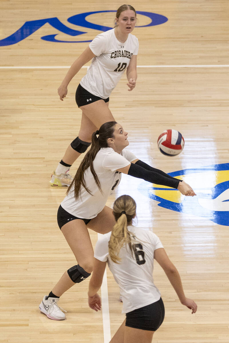 Faith Lutheran senior Sienna Lopez (14) competes during the high school volleyball game against ...