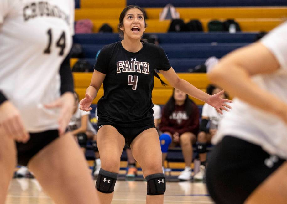 Faith Lutheran junior Leah Hernandez (4) directs her teammates during the high school volleybal ...