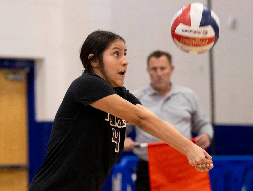 Faith Lutheran junior Leah Hernandez (4) competes during the high school volleyball game agains ...