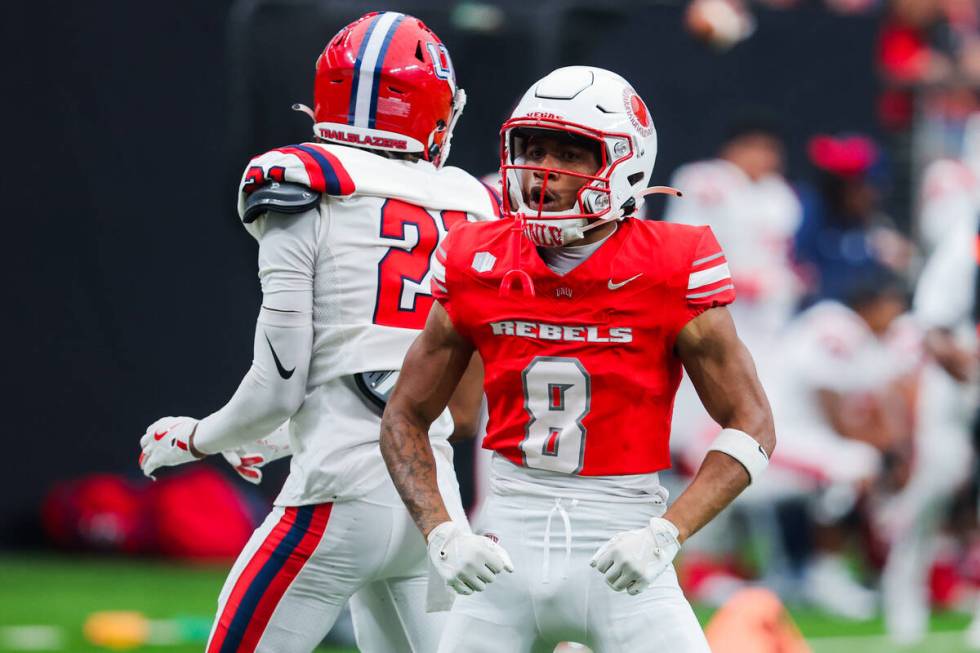 UNLV wide receiver Timothy Conerly (8) gets pumped up during an NCAA football game between UNLV ...