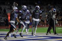 Basic’s Louden Cahill (6) celebrates his pick-two over Green Valley during the second ha ...