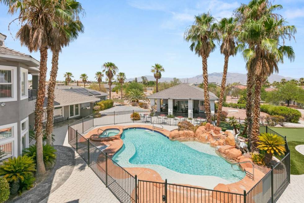 This Centennial Hills home is currently on the market for $11.99 million. Check out the pool ar ...