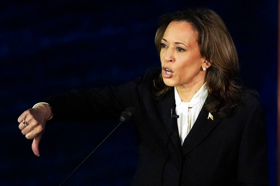 Democratic presidential nominee Vice President Kamala Harris gestures as she speaks during a pr ...