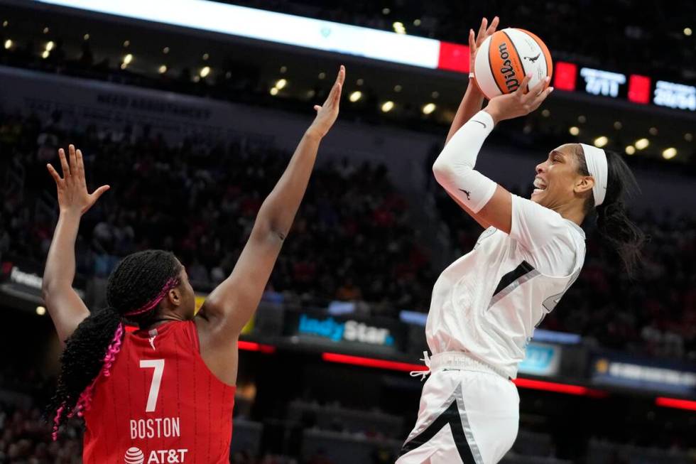 Las Vegas Aces' A'ja Wilson shoots over Indiana Fever's Aliyah Boston (7) during the second hal ...