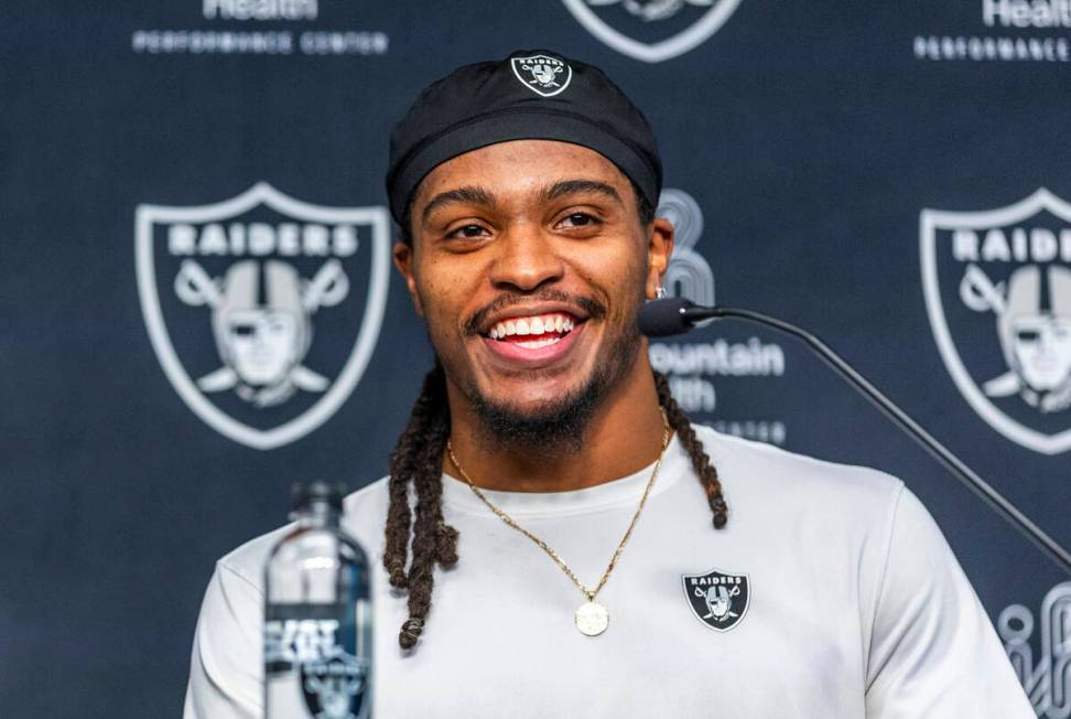 Raiders wide receiver Tyreik McAllister (32) laughs at a question during a media interview afte ...