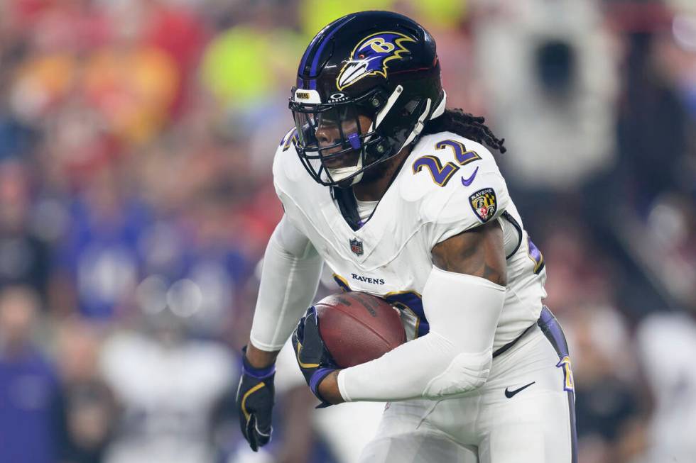 Baltimore Ravens running back Derrick Henry carries the ball against the Kansas City Chiefs dur ...