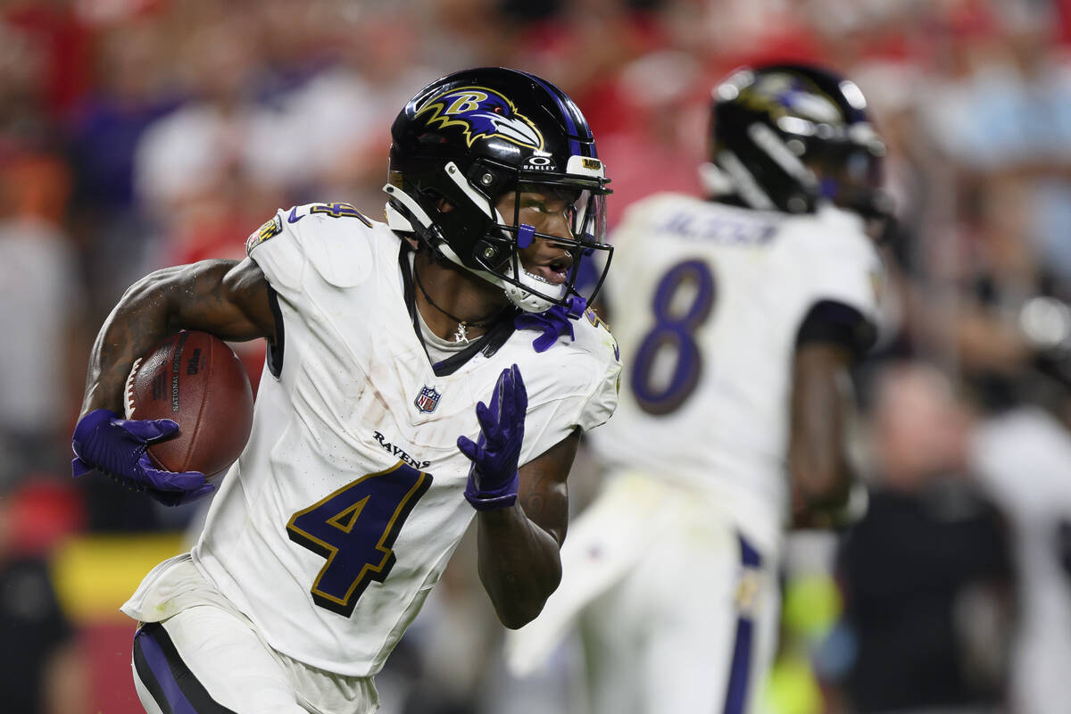 Baltimore Ravens wide receiver Zay Flowers runs the ball against the Kansas City Chiefs during ...