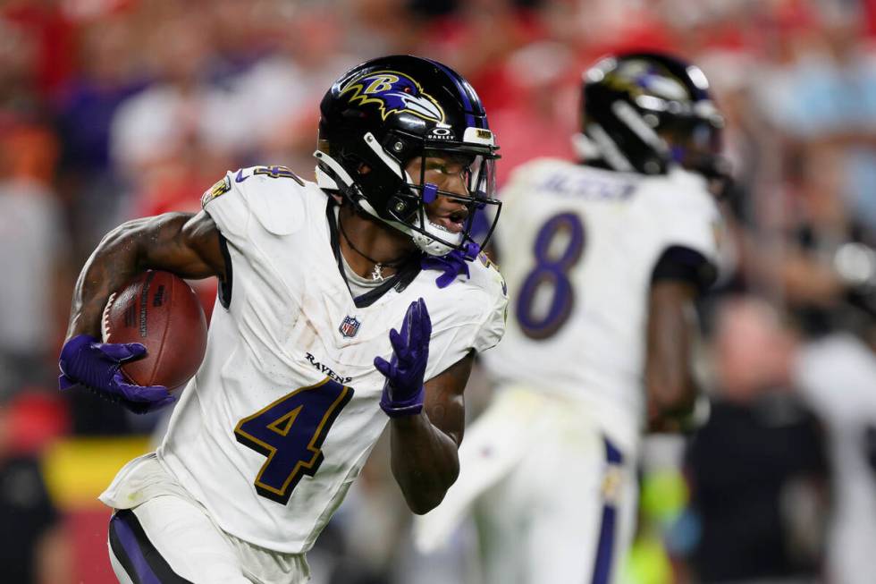 Baltimore Ravens wide receiver Zay Flowers runs the ball against the Kansas City Chiefs during ...