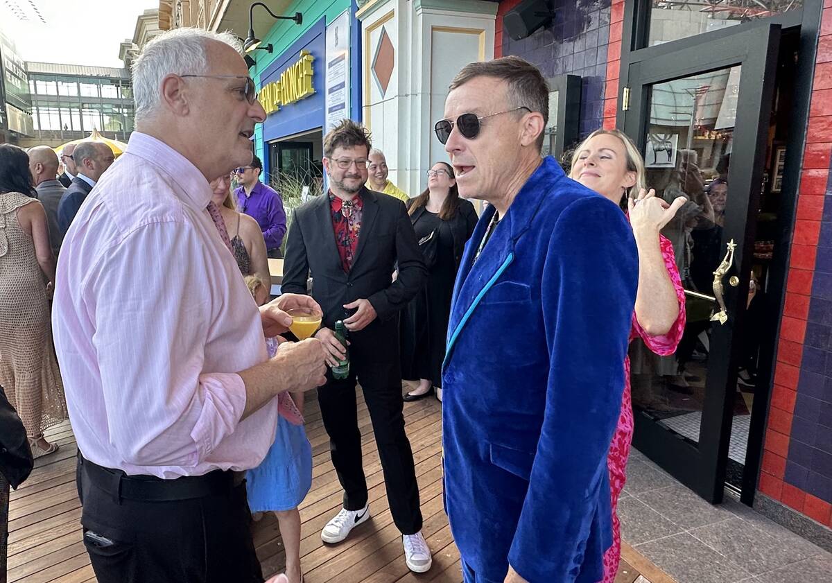 Caesars Palace executive Gary Selesner and Spiegelworld founder Ross Mollison are shown during ...