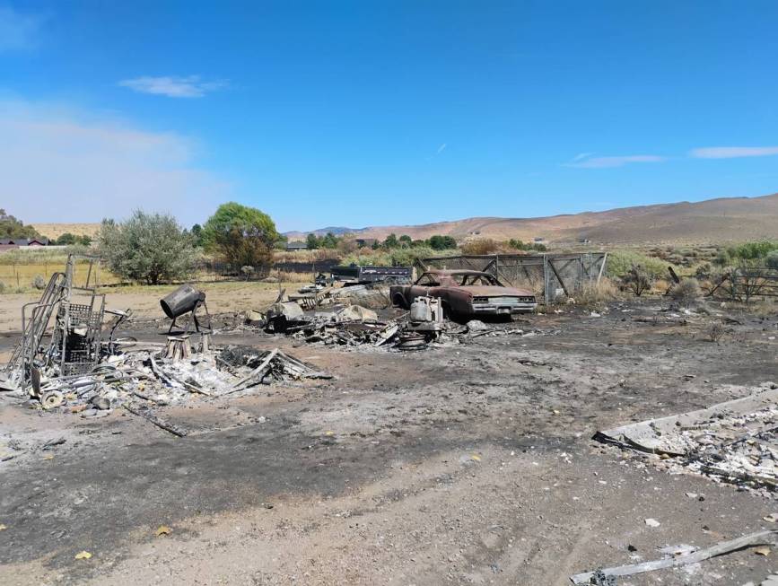 The damage to JoAnna Warthan's family home in Washoe Valley caused by the Davis Fire is seen in ...