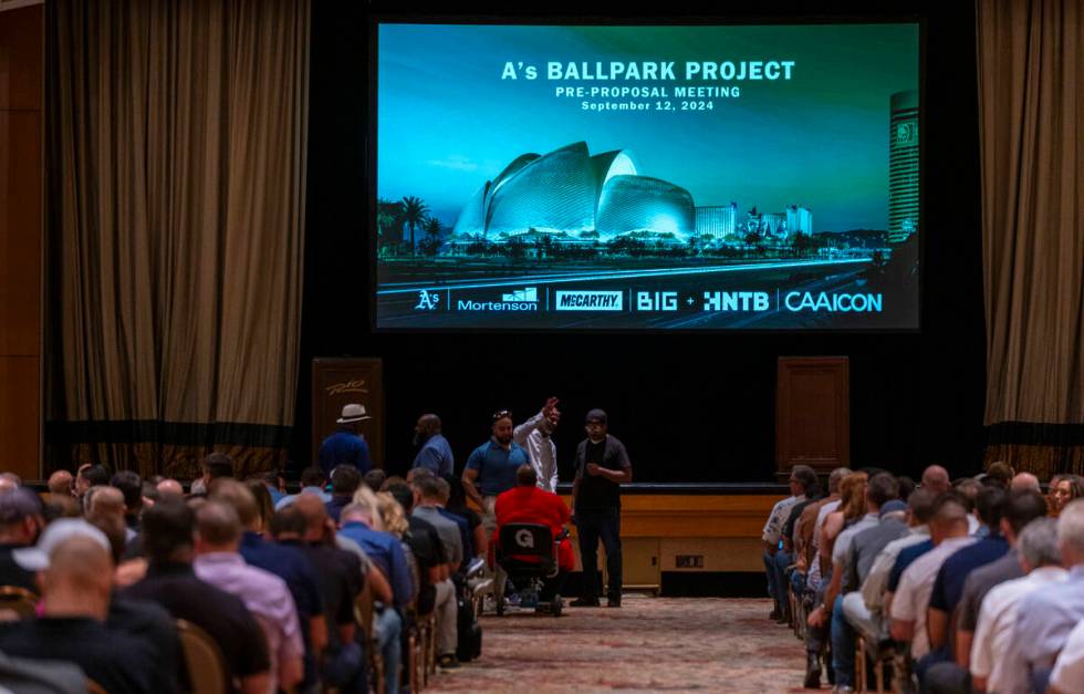 Attendees sit as Mortenson-McCarthy, the Athletic's stadium construction manager, hosts a ballp ...