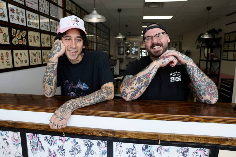 Franco Adonis, left, and Pete Mills, who call themselves tattooers, pose at Last Love Tattoo Pa ...