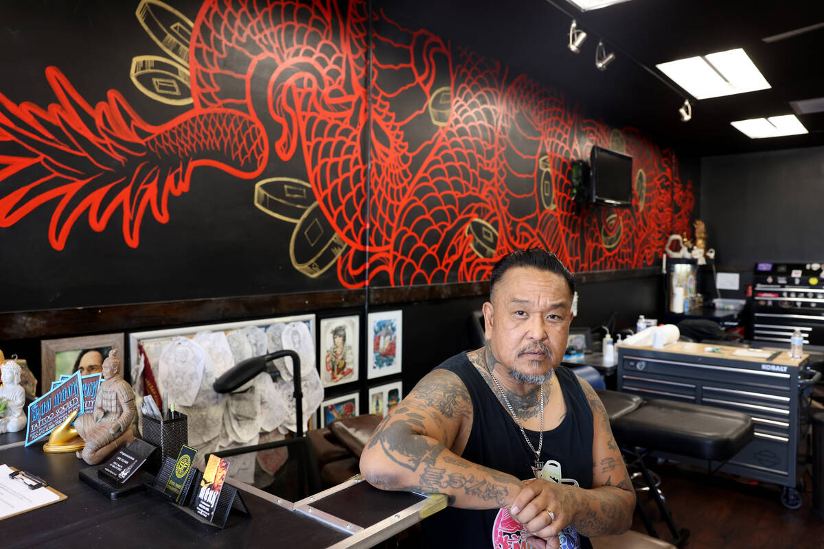 Monk, owner of The Iron Monk Tattoo Society, poses at his shop on South Pecos Road in Las Vegas ...