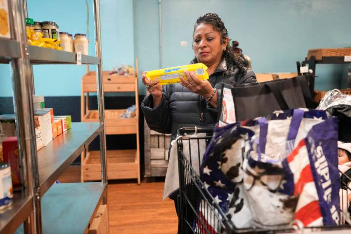 Betsy Quiroa shops at a market-style food pantry at the Carver Center in Port Chester, N.Y., We ...