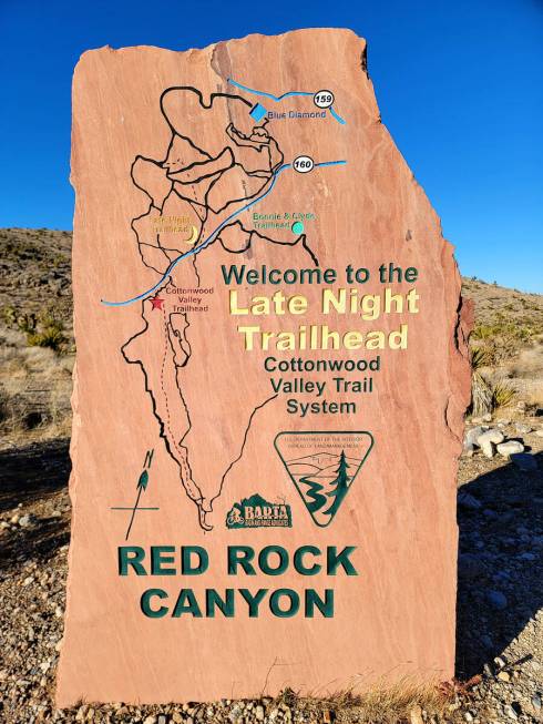 A sign at Late Night Trailhead helps bikers and hikers choose their routes. (Natalie Burt)