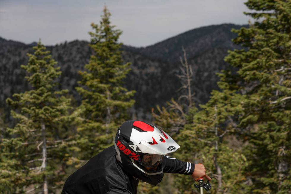 A mountain biker rounds a curve at Lee Canyon on Saturday, Sept. 7, 2024, at Mount Charleston. ...