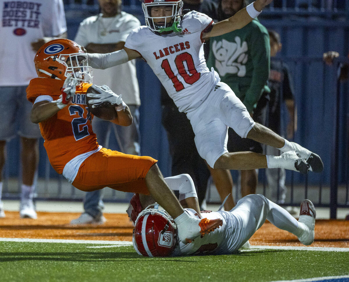 Bishop Gorman running back Myles Norman (24) is caught near the end zone after a long run by Or ...