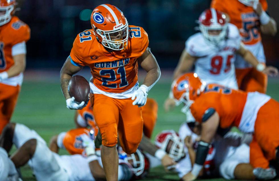 Bishop Gorman running back Jonathan Coar (21) sprints towards the end zone against Orange Luthe ...