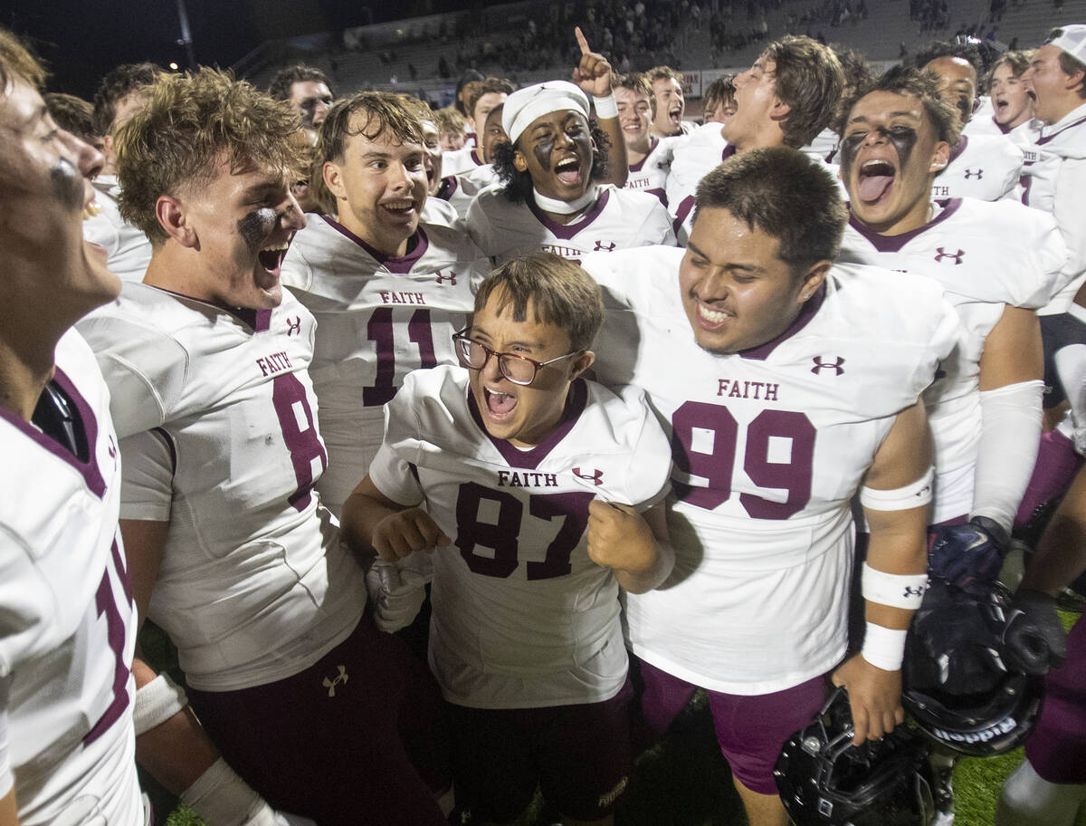 Faith Lutheran celebrates the 35-20 win over Shadow Ridge at Shadow Ridge High School, Friday, ...