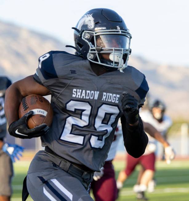 Shadow Ridge junior Trevin Young (29) competes during the high school football game against Fai ...