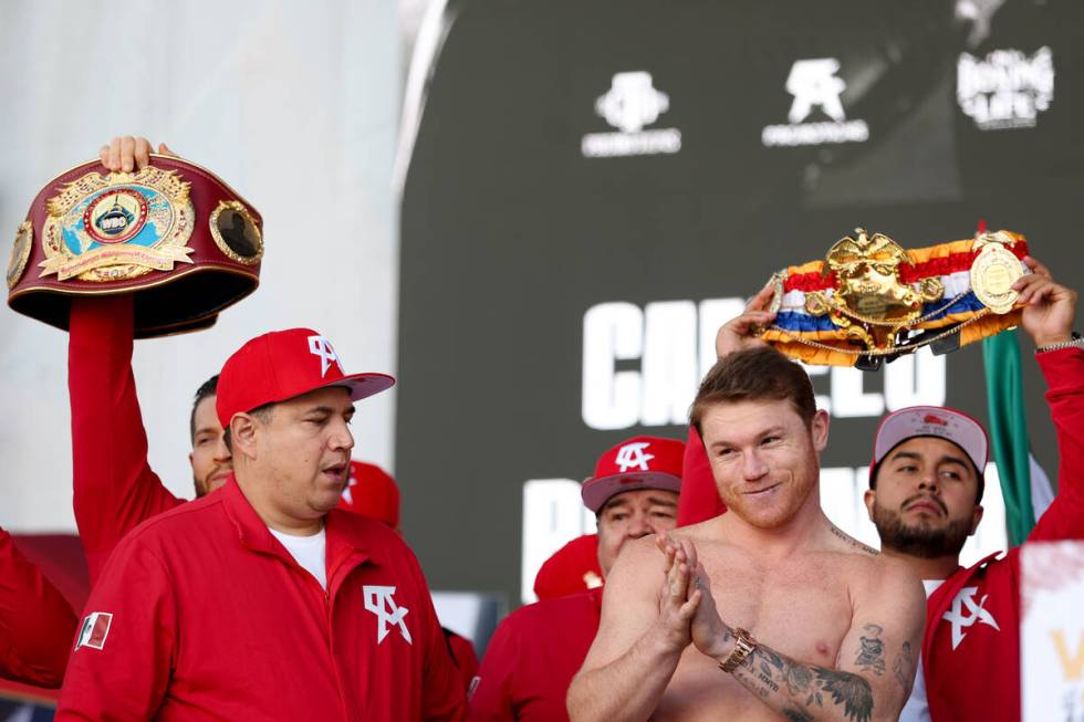 Canelo Alvarez gestures to his family during weigh in ahead of his super middleweight title box ...