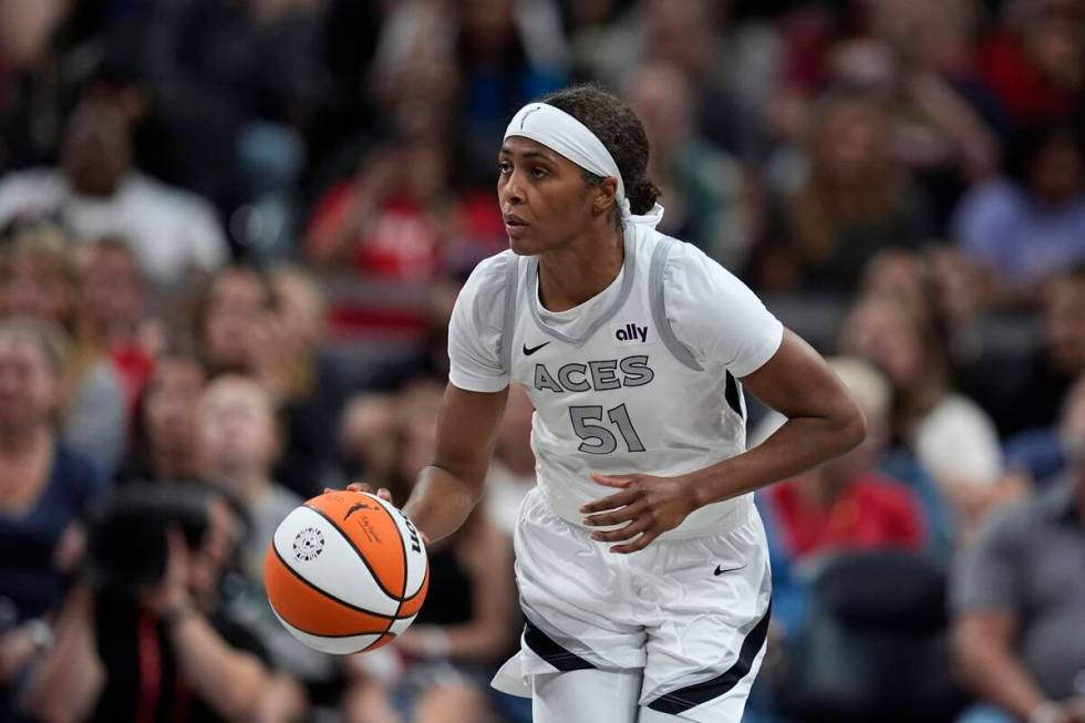 Las Vegas Aces' Sydney Colson dribbles during the second half of a WNBA basketball game against ...