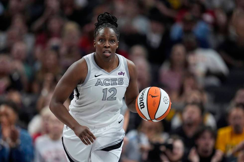 Las Vegas Aces' Chelsea Gray dribbles during the second half of a WNBA basketball game against ...