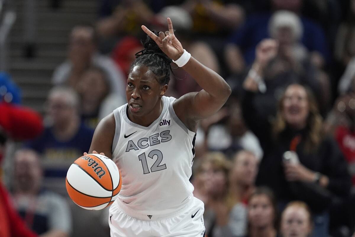 Las Vegas Aces' Chelsea Gray dribbles during the second half of a WNBA basketball game against ...