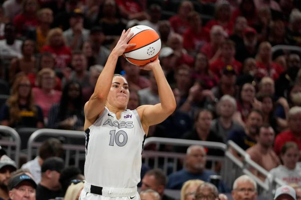 Las Vegas Aces' Kelsey Plum shoots during the second half of a WNBA basketball game against the ...