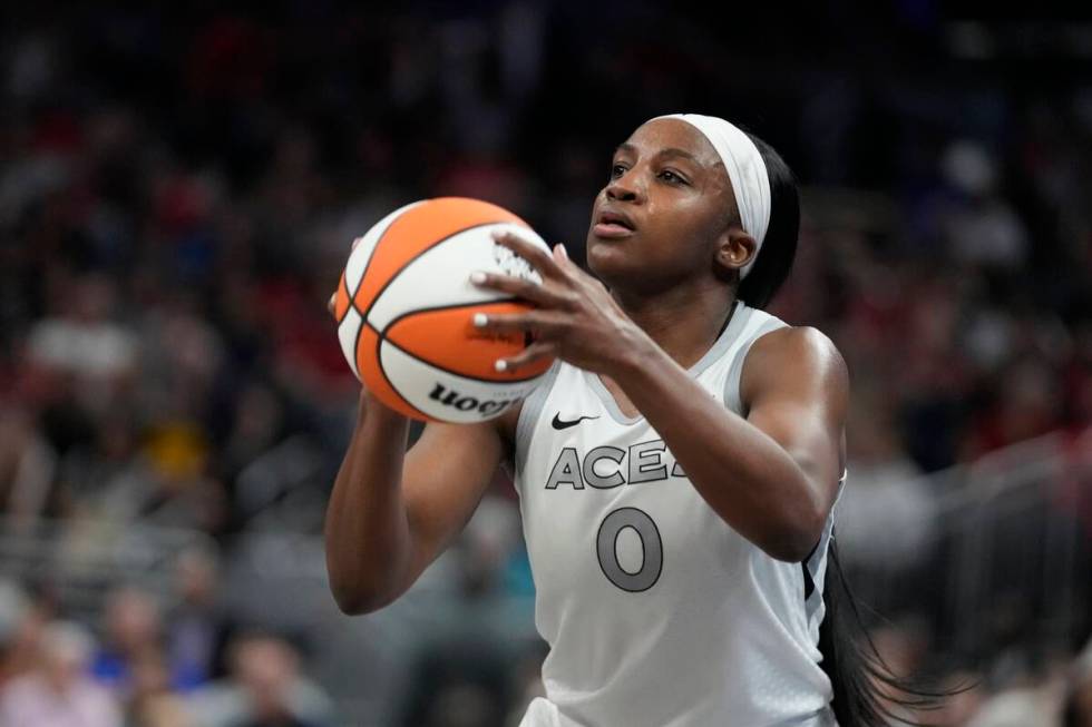 Las Vegas Aces' Jackie Young shoots during the second half of a WNBA basketball game against th ...