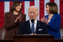 FILE - Vice President Kamala Harris, left, and House Speaker Nancy Pelosi, right, applaud as Jo ...