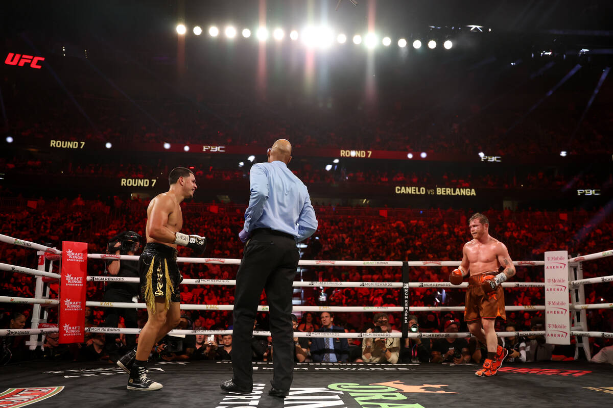 Edgar Berlanga, left, and Canelo Alvarez smile as they convene to fight during a super middlewe ...