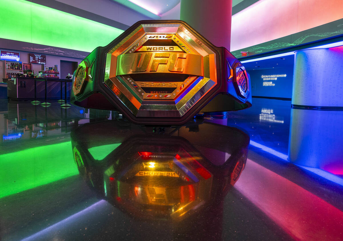 A giant UFC belt is on the floor to greet attendees on the main concourse during UFC 306: Riyad ...