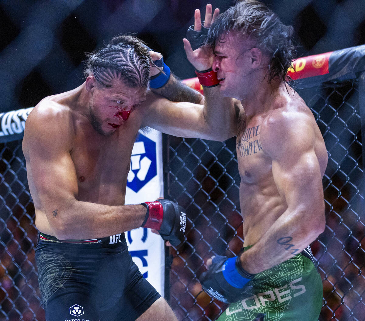 Featherweight Brian Ortega and Diego Lopes trade blows in their fight during UFC 306: Riyadh Se ...