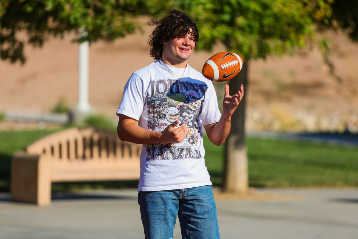 Christian Thatcher throws a football around with friends at Sunny Springs Park on Wednesday, Se ...