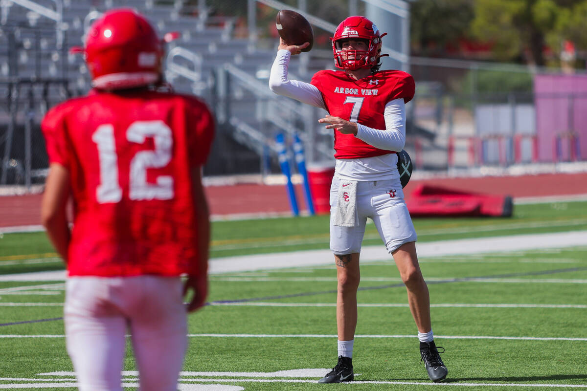 Arbor View quarterback Thaddeus Thatcher throws the ball during a practice at Arbor View High S ...