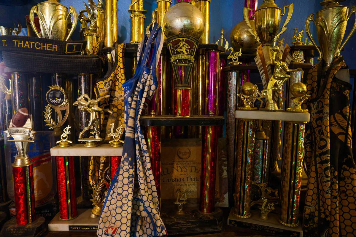 Trophies won by Thaddeus and Christian Thatcher are displayed inside of their family home on Th ...