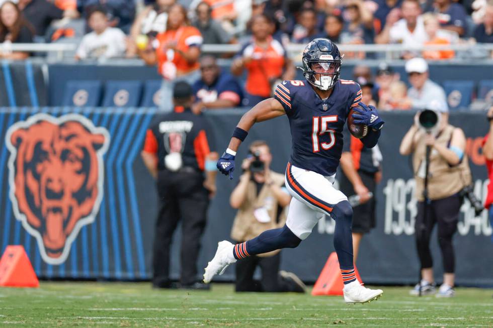 Chicago Bears wide receiver Rome Odunze (15) runs with the ball against the Cincinnati Bengals ...