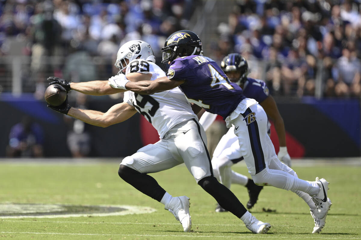 Las Vegas Raiders tight end Brock Bowers (89) catches the ball against Baltimore Ravens cornerb ...