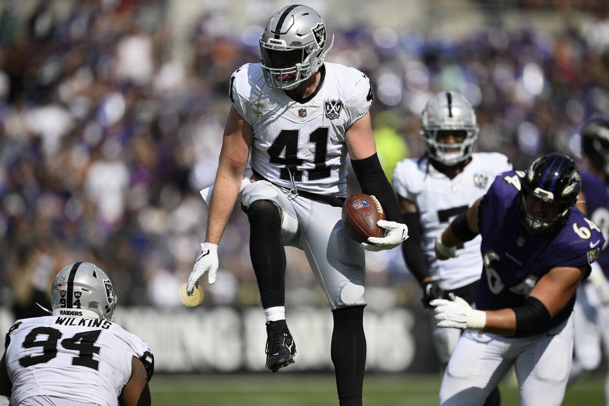 Las Vegas Raiders linebacker Robert Spillane (41) celebrates after making an interception again ...