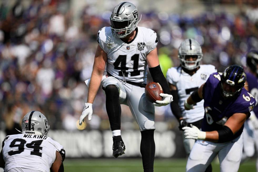 Las Vegas Raiders linebacker Robert Spillane (41) celebrates after making an interception again ...