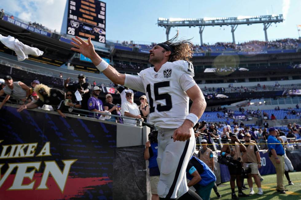 Las Vegas Raiders quarterback Gardner Minshew (15) runs off the field after the Las Vegas Raide ...