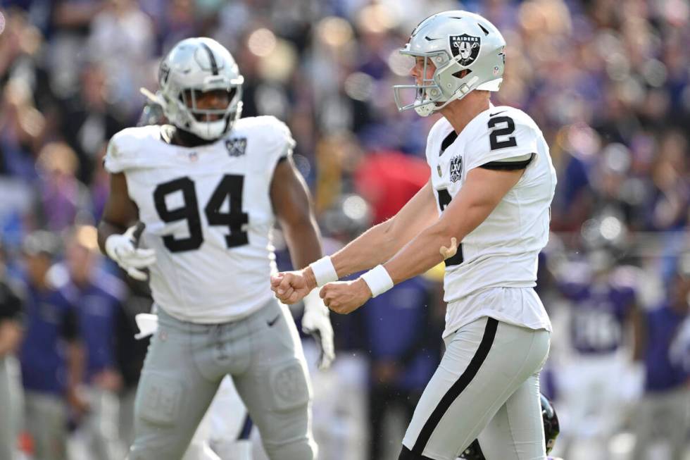 Las Vegas Raiders place kicker Daniel Carlson (2) celebrates kicking the game winning field goa ...