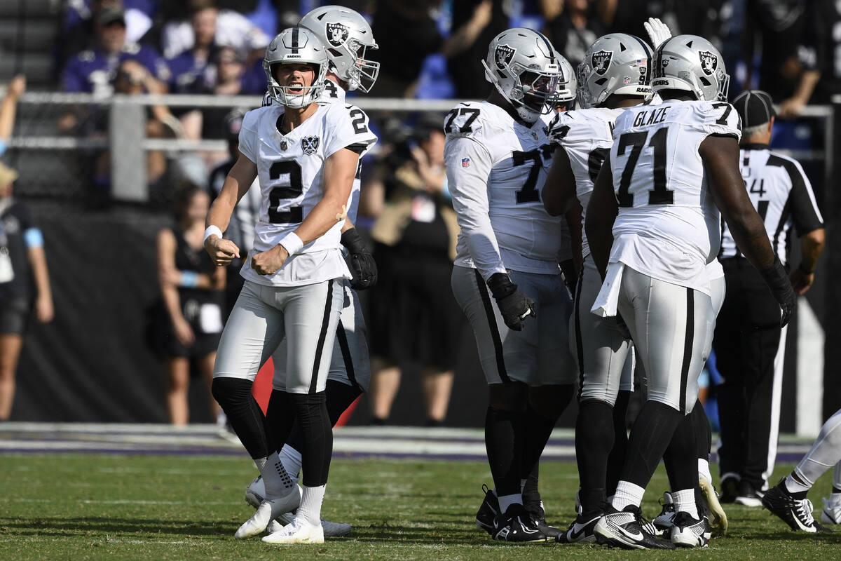 Las Vegas Raiders place kicker Daniel Carlson (2) celebrates after kicking a field goal against ...