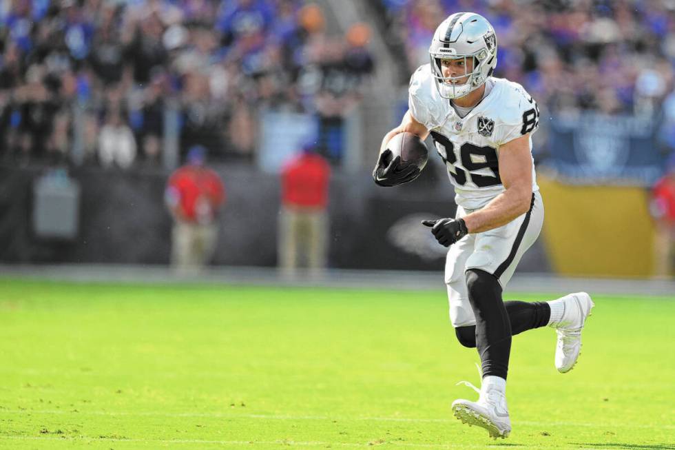 Las Vegas Raiders tight end Brock Bowers (89) runs against the Baltimore Ravens during the seco ...