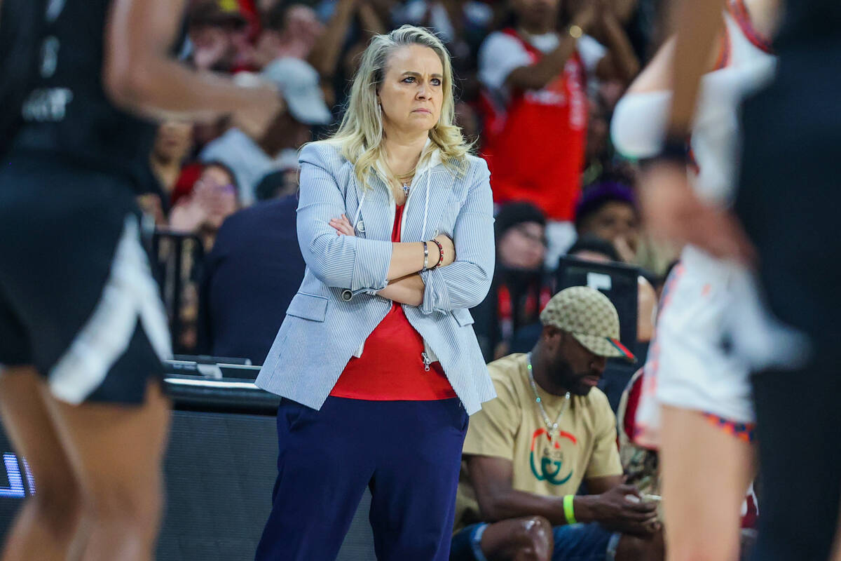 Aces head coach Becky Hammon watches game action from the sidelines during a WNBA basketball ga ...