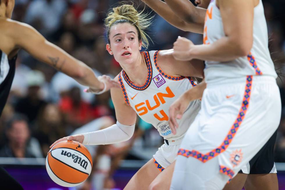 Connecticut Sun guard Marina Mabrey (4) looks to pass the ball to a teammate during a WNBA bask ...