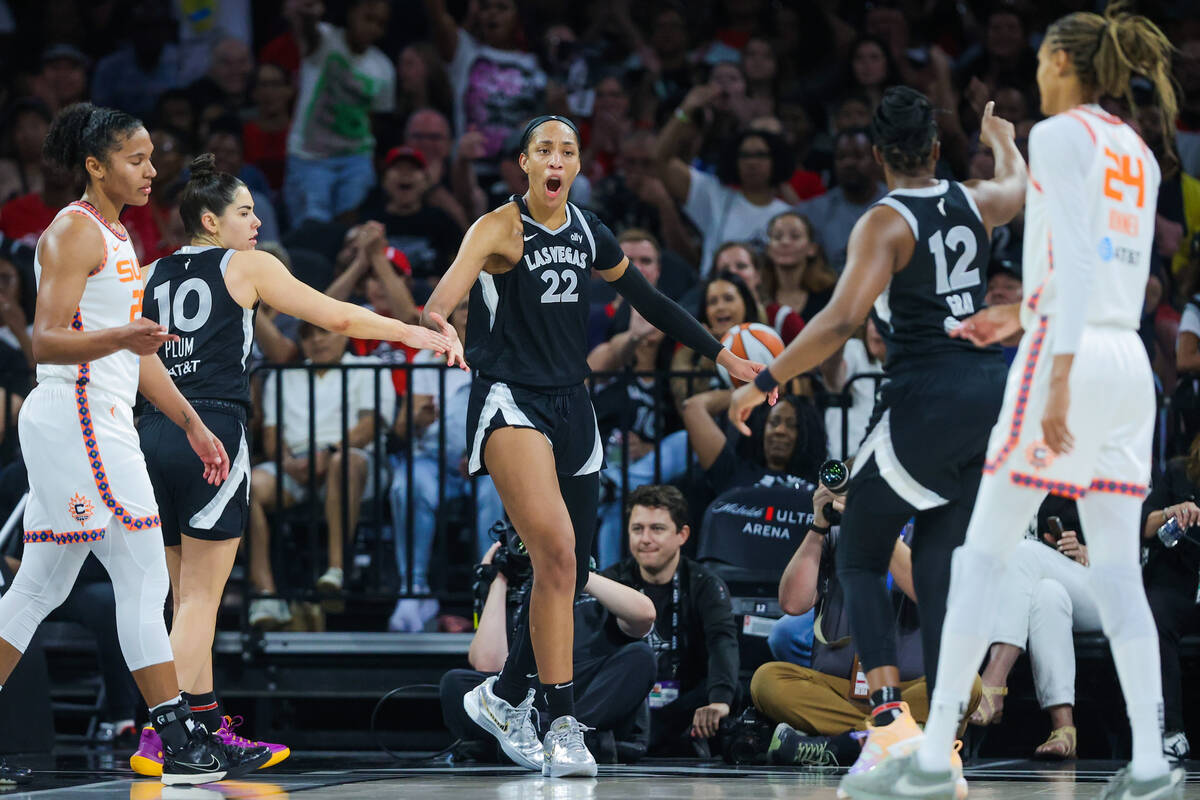 Aces center A'ja Wilson (22) gets pumped up during a WNBA basketball game between the Aces and ...