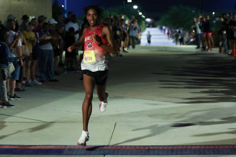 Desert Oasis’ Kenan Dagge finishes first in the boys “South of Sahara” sec ...